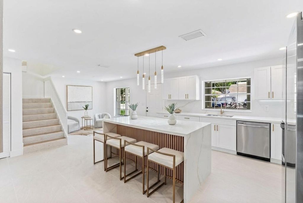 Photo of 301 NW 78th Terrace, Plantation, FL 33324 (MLS # B26006925)