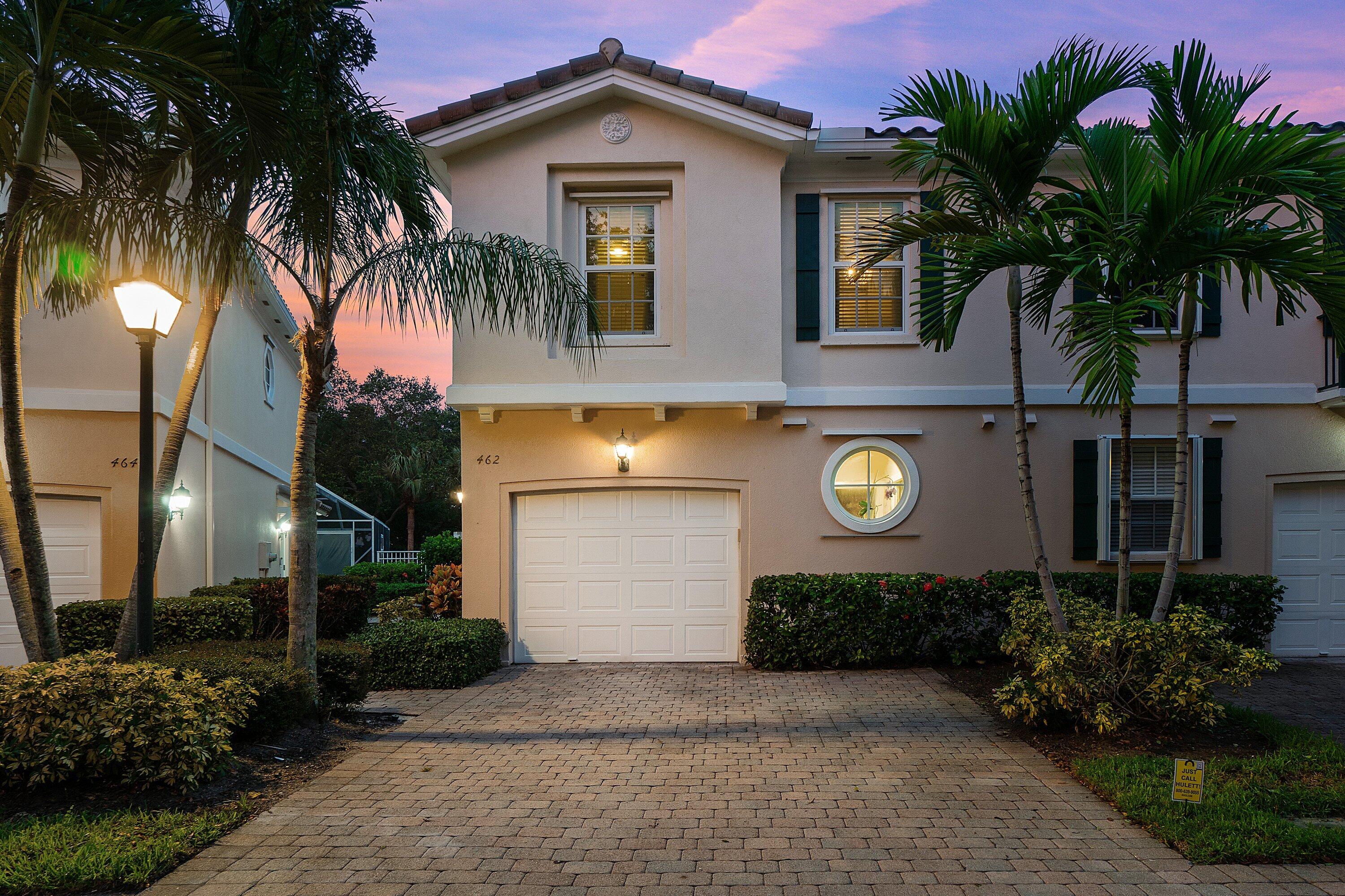 This beautifully updated 3BD/2.5BA two-story townhome offers the perfect combination of privacy, style, and unbeatable location. Featuring a new roof and hurricane impact-resistant glass throughout, this coastal contemporary residence is move-in ready with new wood-look flooring on both levels--no carpet in sight. The open living space flows to a private, screened, and covered patio that overlooks a lush greenbelt, complete backyard privacy enhanced by decorative lighting, new landscaping, and low-maintenance turf, creating a private yard-like feel.Inside, you'll find custom closets with built-ins, stainless steel kitchen appliances, and a new roof installed in 2023. Every detail has been thoughtfully curated to deliver comfort, convenience, and peace of mind. Low HOA fees!