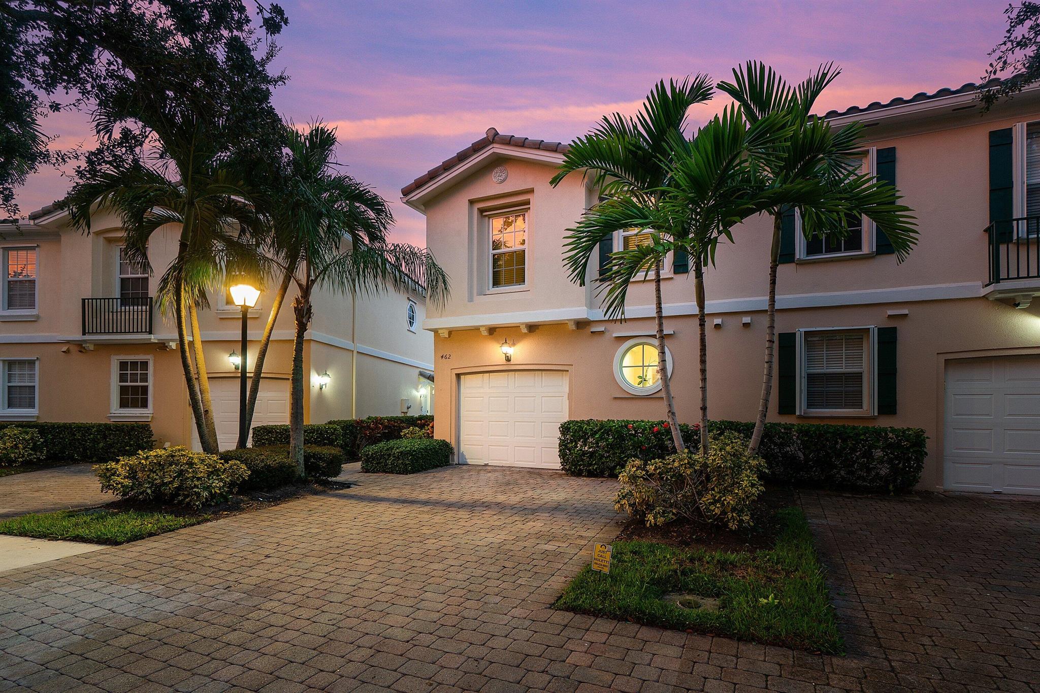This beautifully updated 3BD/2.5BA two-story townhome offers the perfect combination of privacy, style, and unbeatable location. Featuring a new roof and hurricane impact-resistant glass throughout, this coastal contemporary residence is move-in ready with new wood-look flooring on both levels--no carpet in sight. The open living space flows to a private, screened, and covered patio that overlooks a lush greenbelt, complete backyard privacy enhanced by decorative lighting, new landscaping, and low-maintenance turf, creating a private yard-like feel.Inside, you'll find custom closets with built-ins, stainless steel kitchen appliances, and a new roof installed in 2023. Every detail has been thoughtfully curated to deliver comfort, convenience, and peace of mind. Low HOA fees!