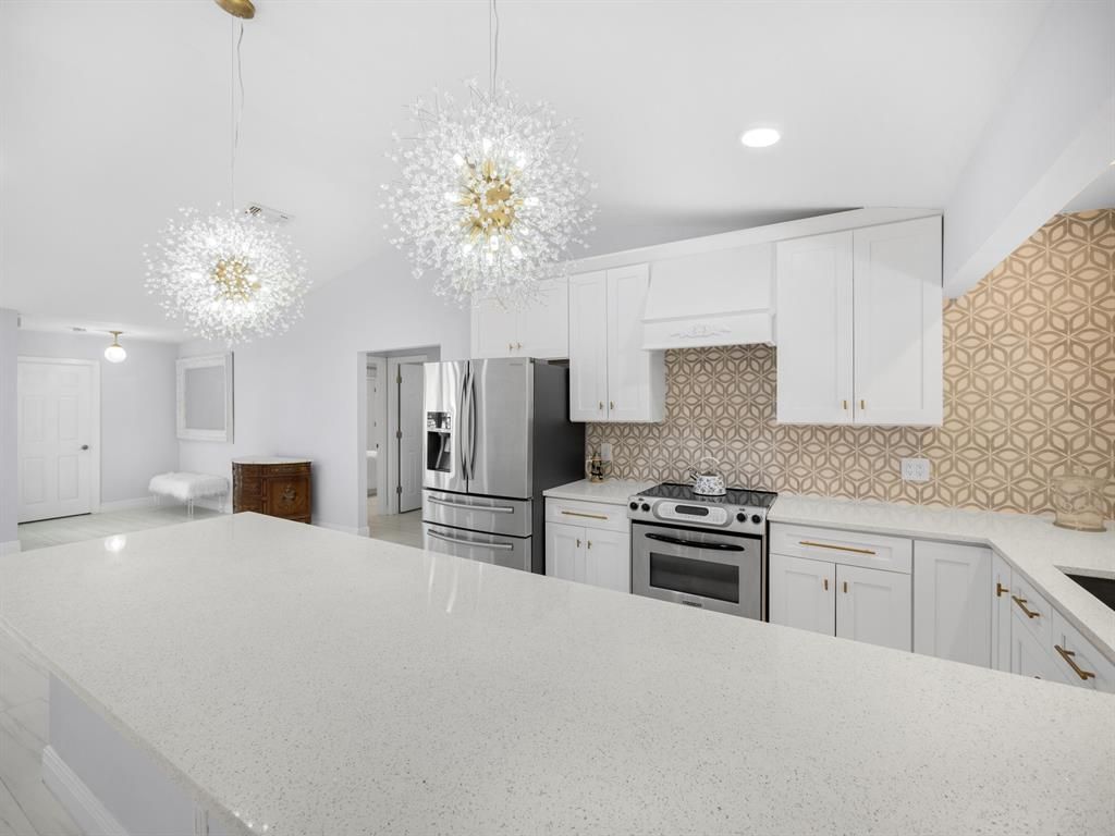 Photo of 949 SW Curtis Street, Port Saint Lucie, FL 34983 (MLS # R10827779)