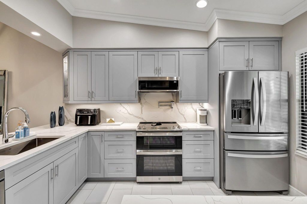 Photo of 2301 Sabal Ridge Court #G, Palm Beach Gardens, FL 33418 (MLS # R11009337)