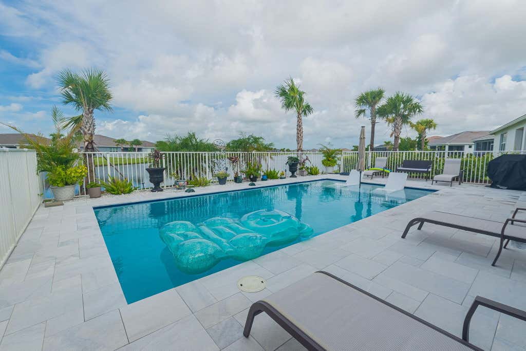 Photo of 10152 SW SARCOLINE Drive, Port Saint Lucie, FL 34987 (MLS # B26062318)
