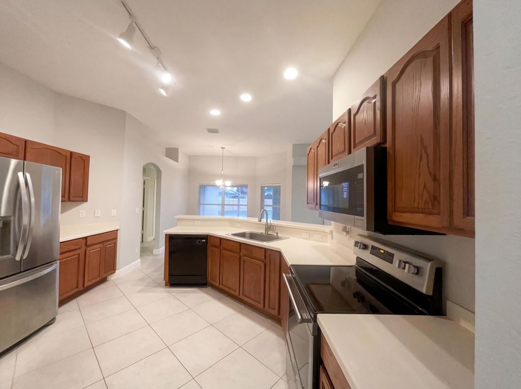 Photo of 5864 NW Hann Drive, Port Saint Lucie, FL 34986 (MLS # B26004860)