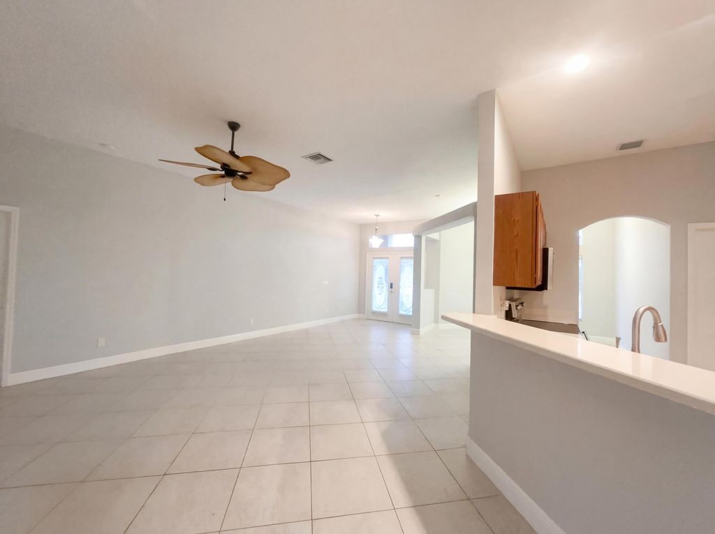 Photo of 5864 NW Hann Drive, Port Saint Lucie, FL 34986 (MLS # B26004860)