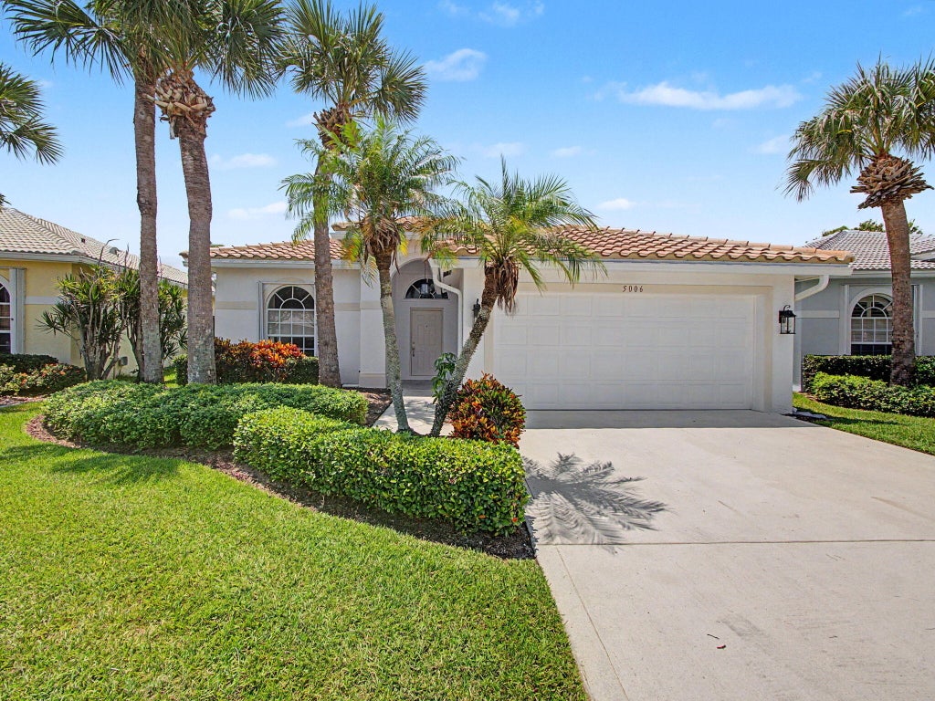Photo of 5006 SE DEVENWOOD Way, Stuart, FL 34997 (MLS # B26061795)