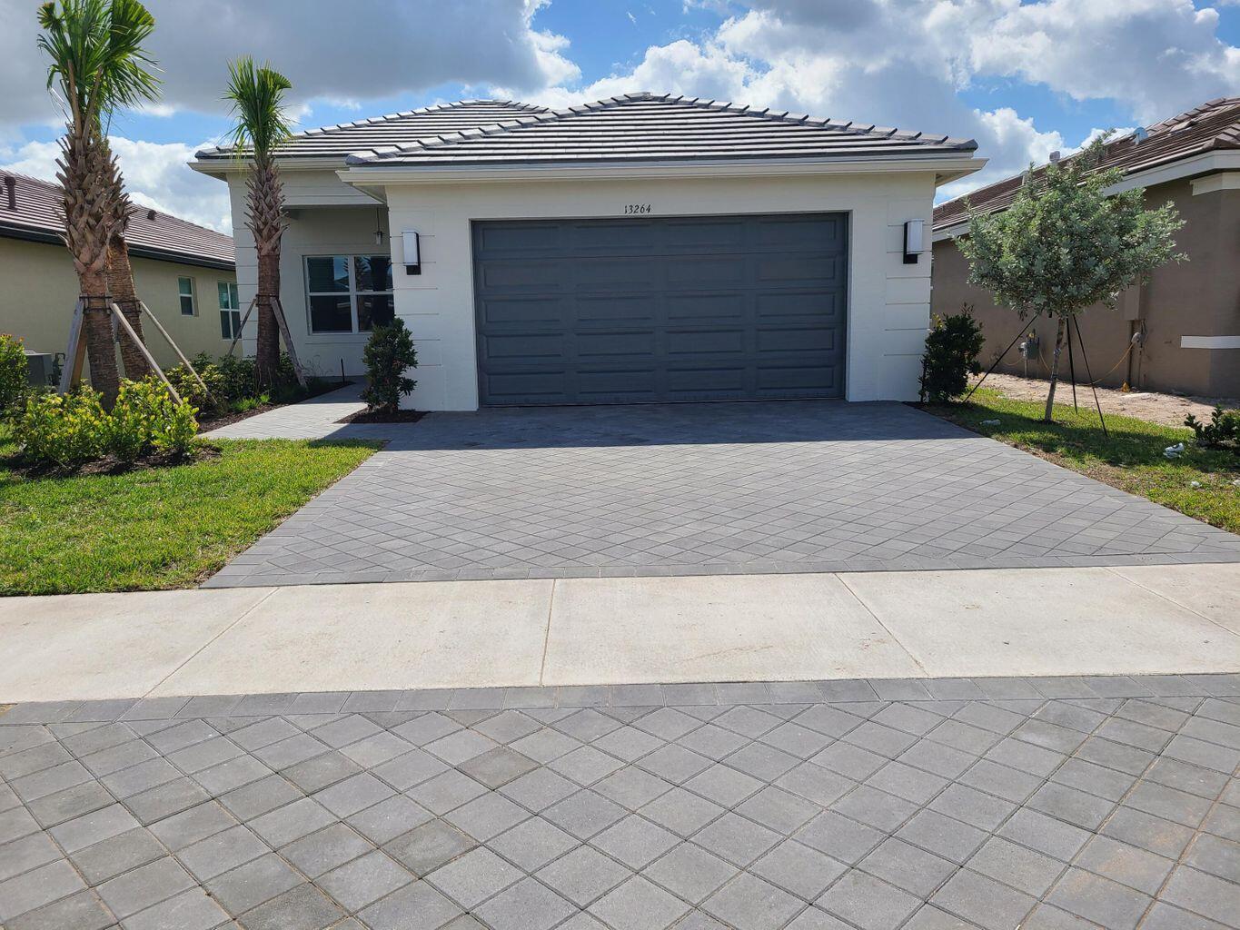 Avail 11/01/25 Live in Port St Lucie's premier and newest Resort Lifestyle 55+ community. Enjoy the 34,000 sqft clubhouse, indoor/outdoor restaurant and bar, pool,hot tub, firepit, 51,000 fitness campus with 4 pools, including PICKLEBALL, TENNIS, BOCCEE BALL AND THE PASEO for walking, biking and golf cart, 5 acres Arts & Culture center. This wonderful Tribecca Model boasts 3 bedrooms (with all walkin closets) plus den/office, 2 1/2 bath, 2 car garage on the water. Open floor plan, ALL tile throughout, upgraded kitchen, gas stainless steel appliances, screen lanai. You are just minutes from, shopping, restaurants right outside the gate and the BRAND NEW Publix grocery/liquor/pharmacy in Riverland Town Center. Plus, sandy beaches, golf, fishing all within a 30 minute drive.