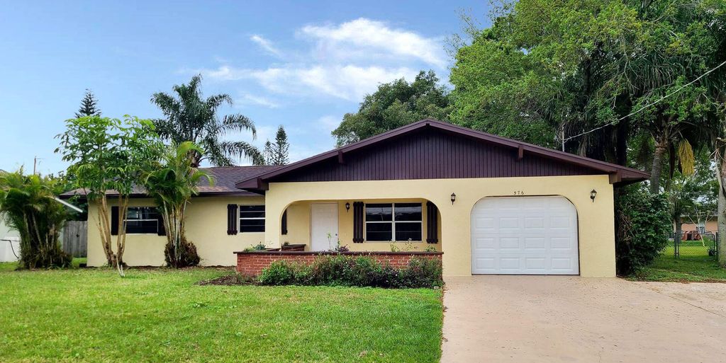 Photo of 576 SE Greenway Terrace, Port Saint Lucie, FL 34983 (MLS # R10966026)