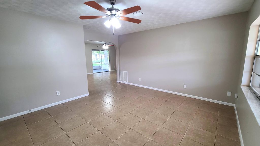 Photo of 576 SE Greenway Terrace, Port Saint Lucie, FL 34983 (MLS # R10966026)