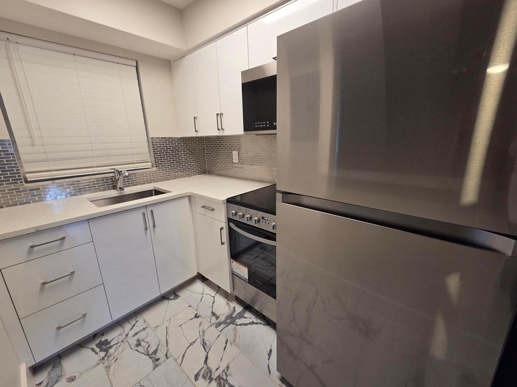 Photo of 5630 NE 18th Avenue #204, Fort Lauderdale, FL 33334 (MLS # B26045234)