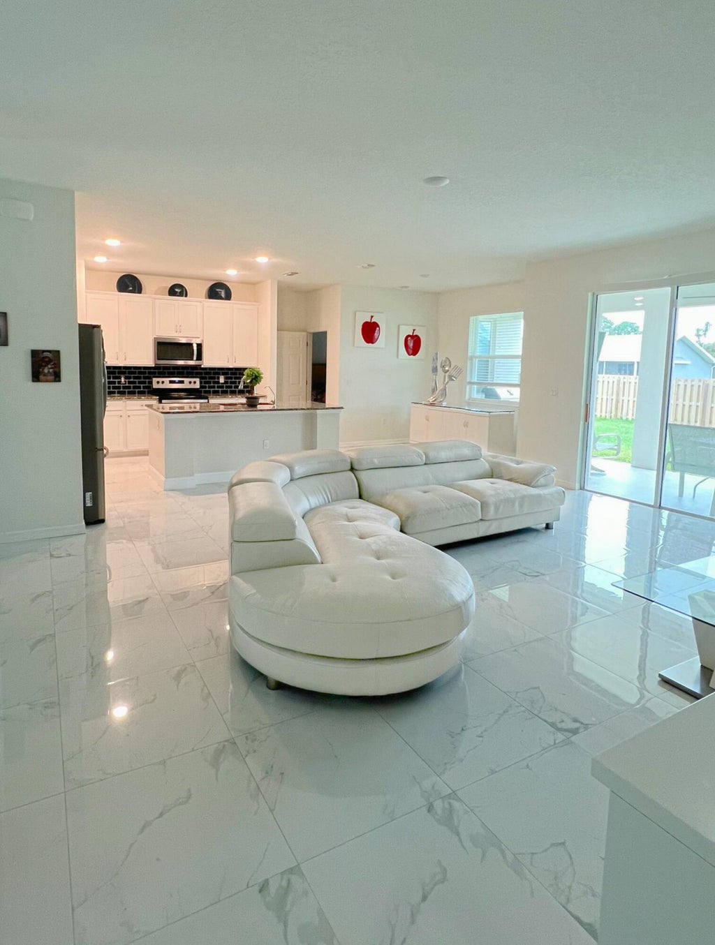 Photo of 103 SW GROVE Avenue, Port Saint Lucie, FL 34983 (MLS # B26077197)
