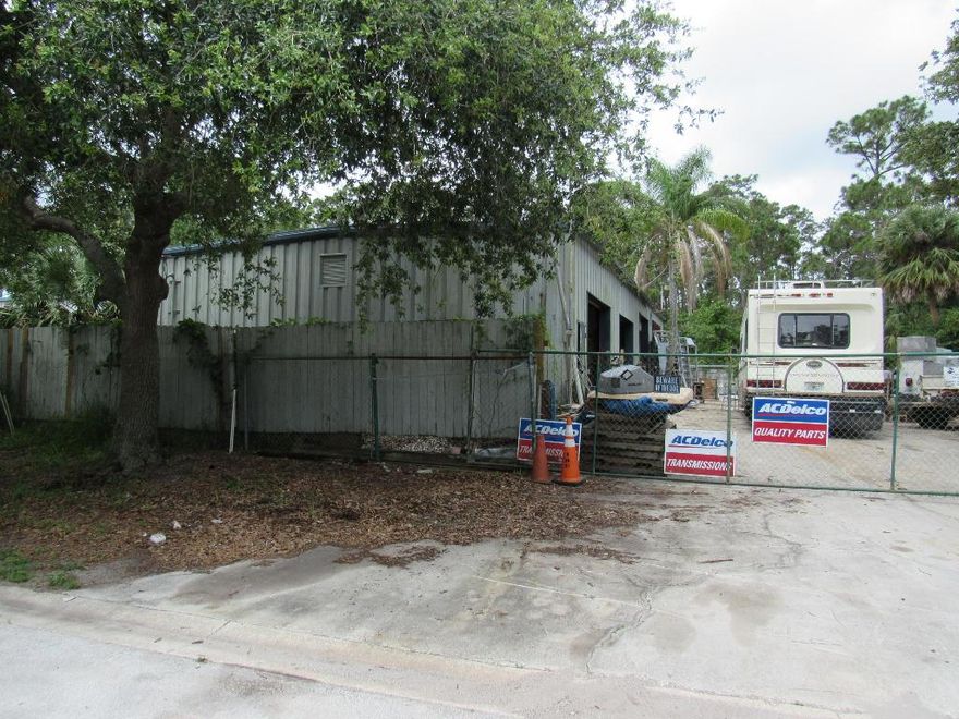 OWNER FINANCING AVAILABLE WITH 20% DOWN. CALL AGENT FOR DETAILS. 3320 SQ FEET OF BUILDING SPACE. STORAGE WAREHOUSE CURRENTLY USED AS AN AUTO SERVICE SHOP AND STORAGE FACILITY.