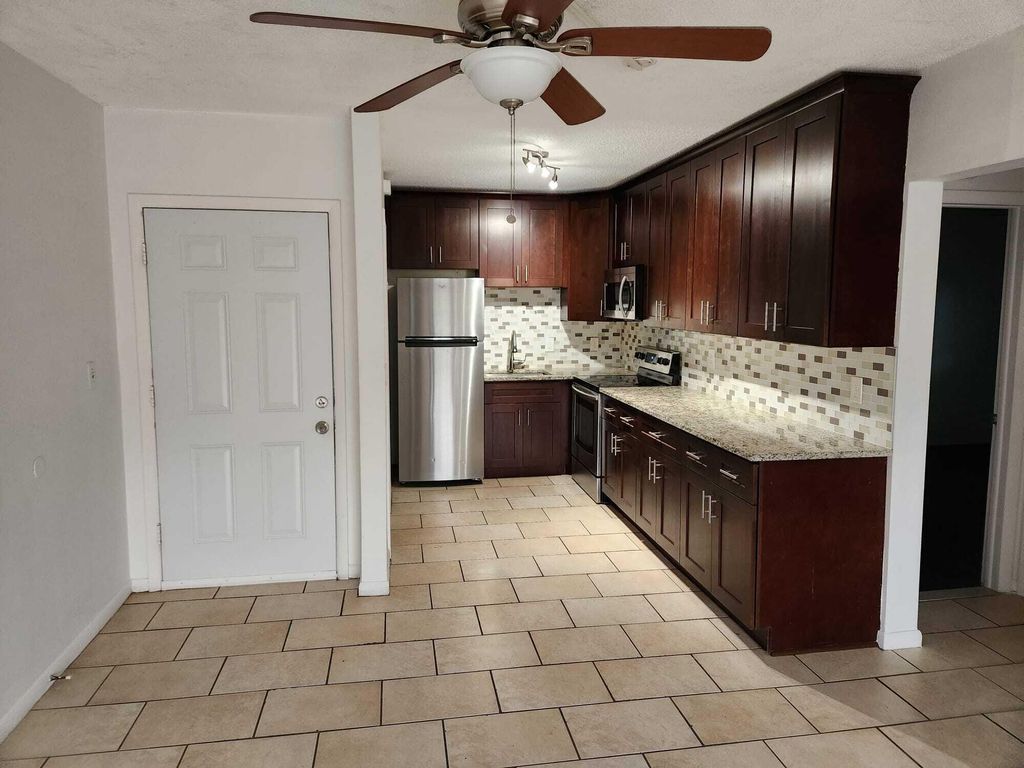 Photo of 1021 Crystal Lake Drive #203, Deerfield Beach, FL 33064 (MLS # B26034848)