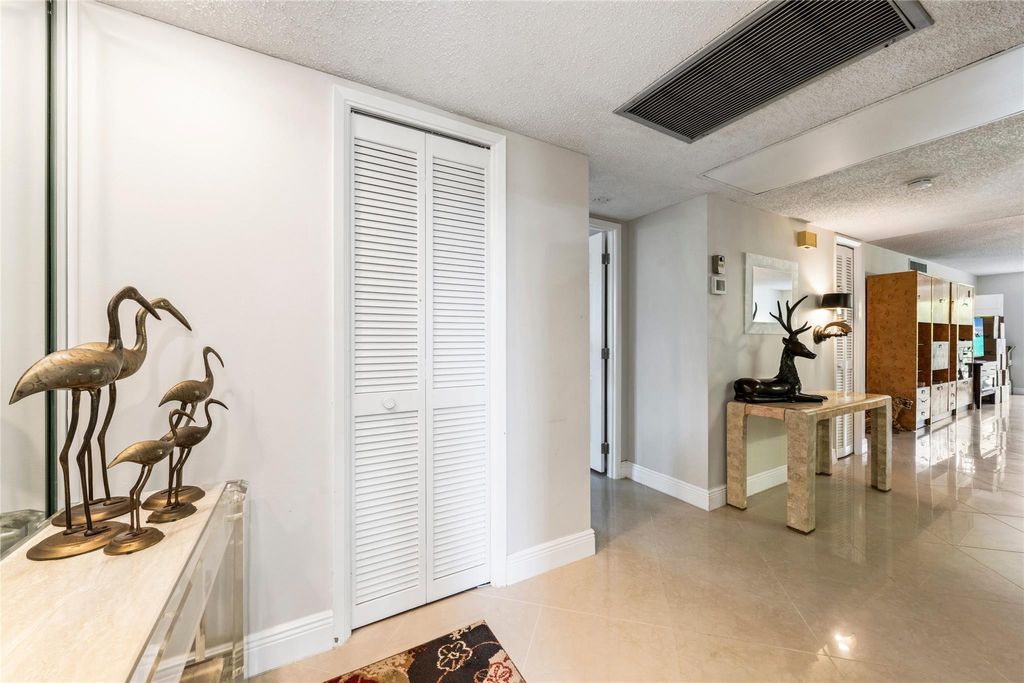 Photo of 3960 Oaks Clubhouse Drive #312, Pompano Beach, FL 33069 (MLS # F10525802)