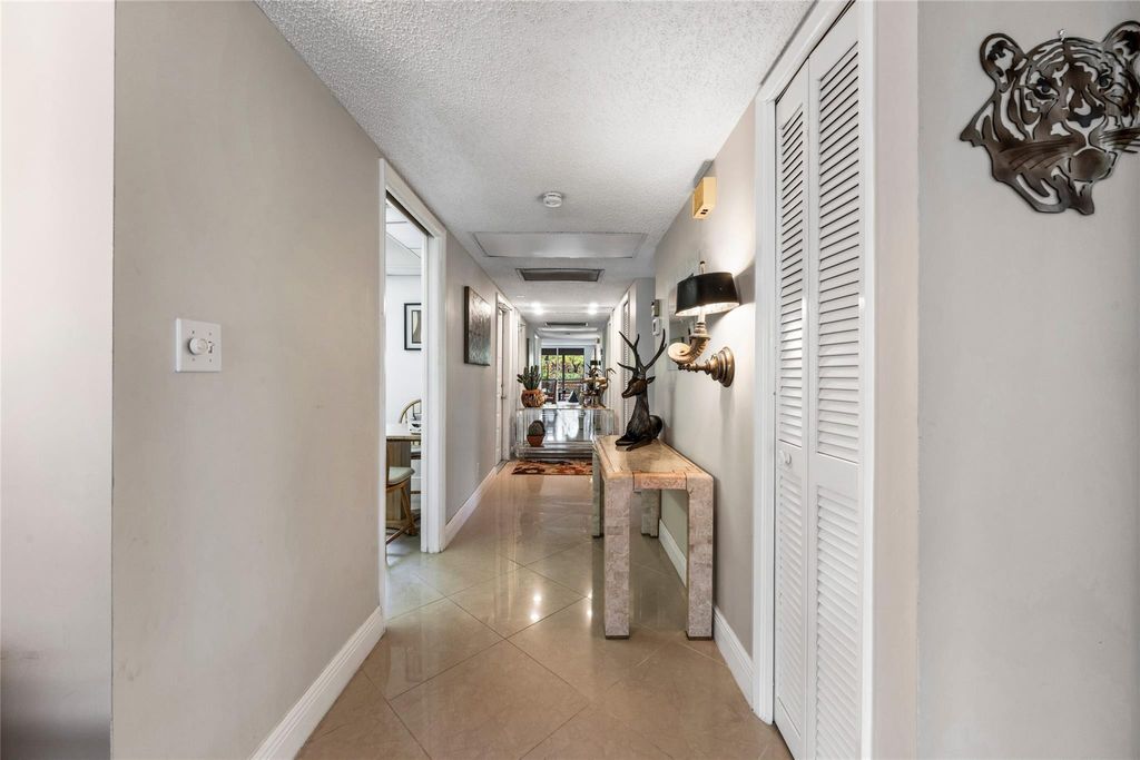Photo of 3960 Oaks Clubhouse Drive #312, Pompano Beach, FL 33069 (MLS # F10525802)