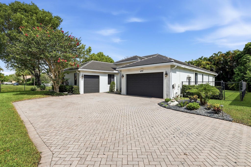 Photo of 4797 NW 72nd Place, Coconut Creek, FL 33073 (MLS # B26073957)