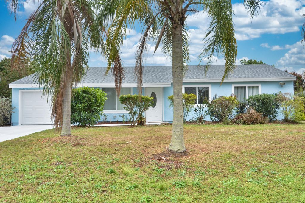 Photo of 420 SE Streamlet Avenue, Port Saint Lucie, FL 34983 (MLS # R11159439)