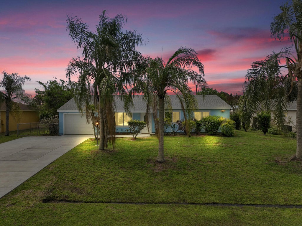 Photo of 420 SE Streamlet Avenue, Port Saint Lucie, FL 34983 (MLS # R11159439)