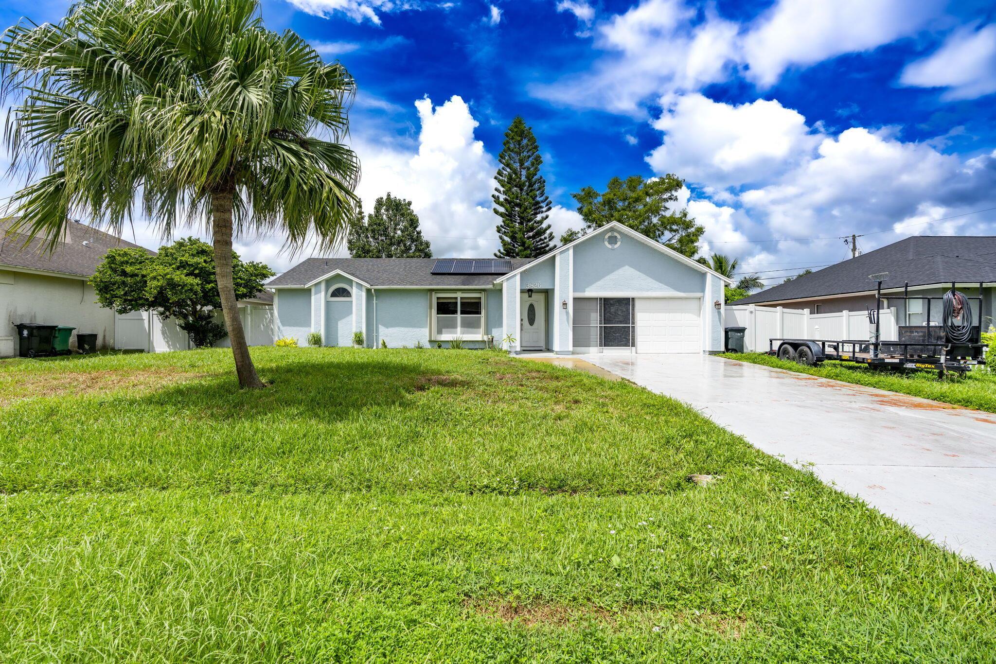 This beautiful CBS family home is move-in ready with a newer roof, A/C, and water heater, offering peace of mind and comfort from the start. Featuring 3 spacious bedrooms, 2 bathrooms, a 2-car garage, and three flexible living areas, there's plenty of room for everyone to spread out and enjoy. The screened-in back porch is perfect for relaxing or entertaining, while the large backyard includes two storage sheds and a chicken coop--ideal for outdoor living and hobbies. The home also comes equipped with solar panels, and best of all, the seller will pay them off at closing, so you can enjoy lower electric bills without the added expense. This is a fantastic opportunity to own a solid, versatile home with modern upgrades and space to live, work, and play!