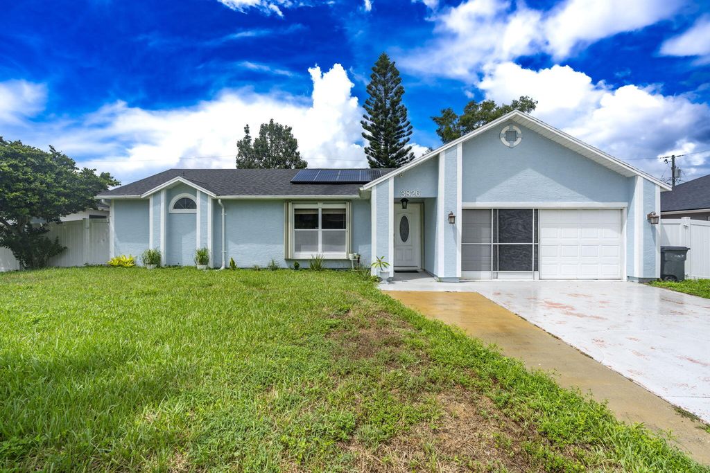 Photo of 3826 SW Kocerik Street, Port Saint Lucie, FL 34953 (MLS # R11122035)