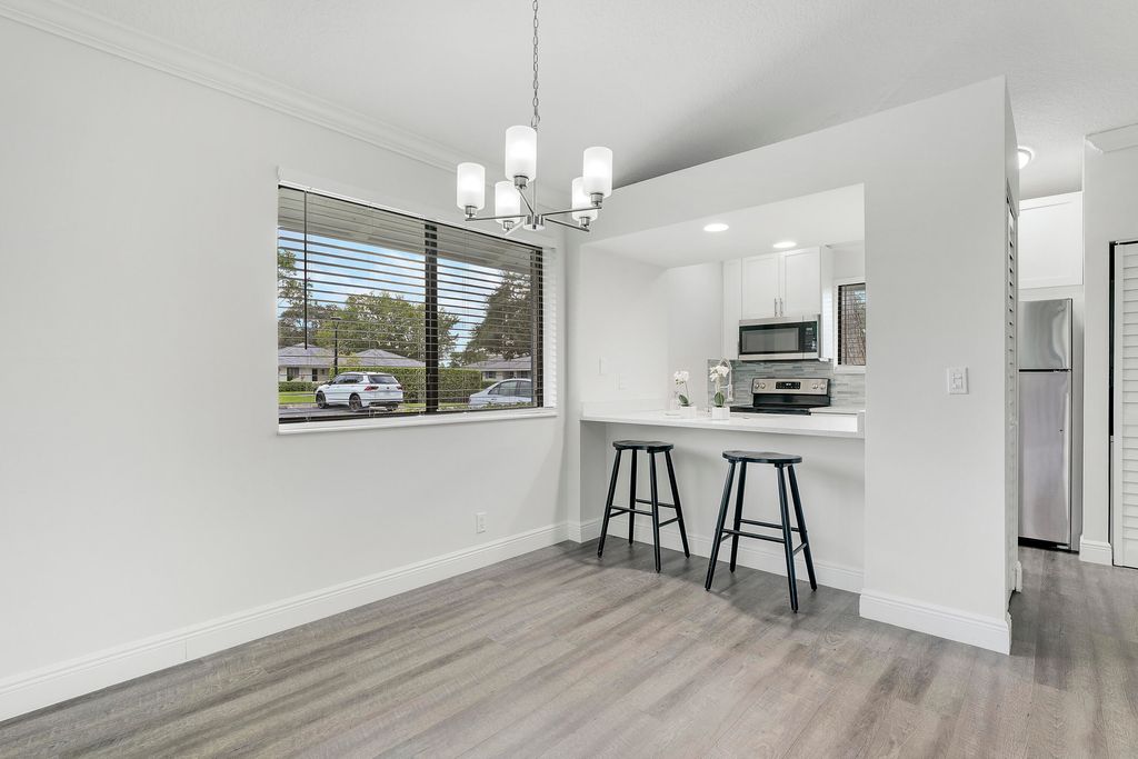 Photo of 828 Club Drive, Palm Beach Gardens, FL 33418 (MLS # R11131752)