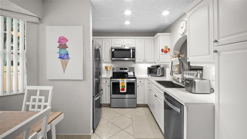 Photo of 11431 Lakeview Drive #5-C, Coral Springs, FL 33071 (MLS # F10545180)