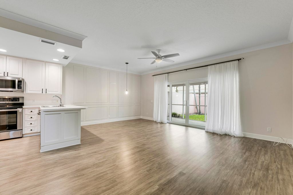 Photo of 2052 Tarpon Lake Way, West Palm Beach, FL 33411 (MLS # B26014284)