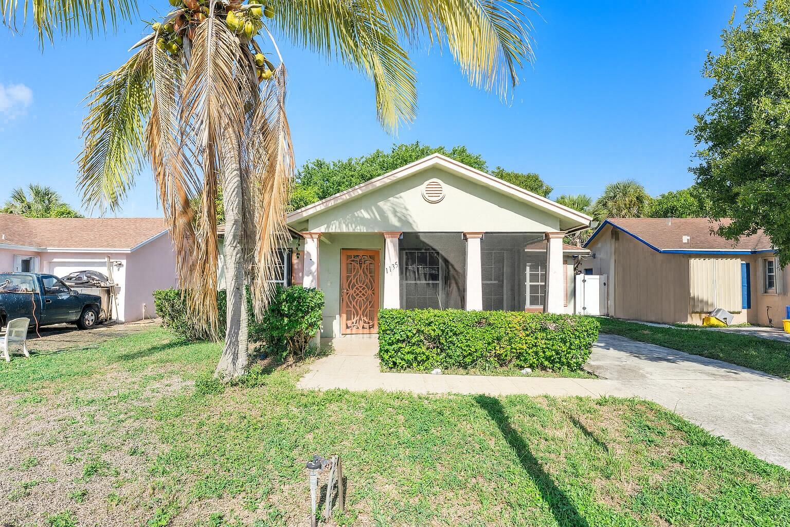 Welcome to this charming 3-bedroom, 2-bath single family home in a well-established West Palm Beach neighborhood. This property features a practical layout with a comfortable screened front porch perfect for enjoying morning coffee.