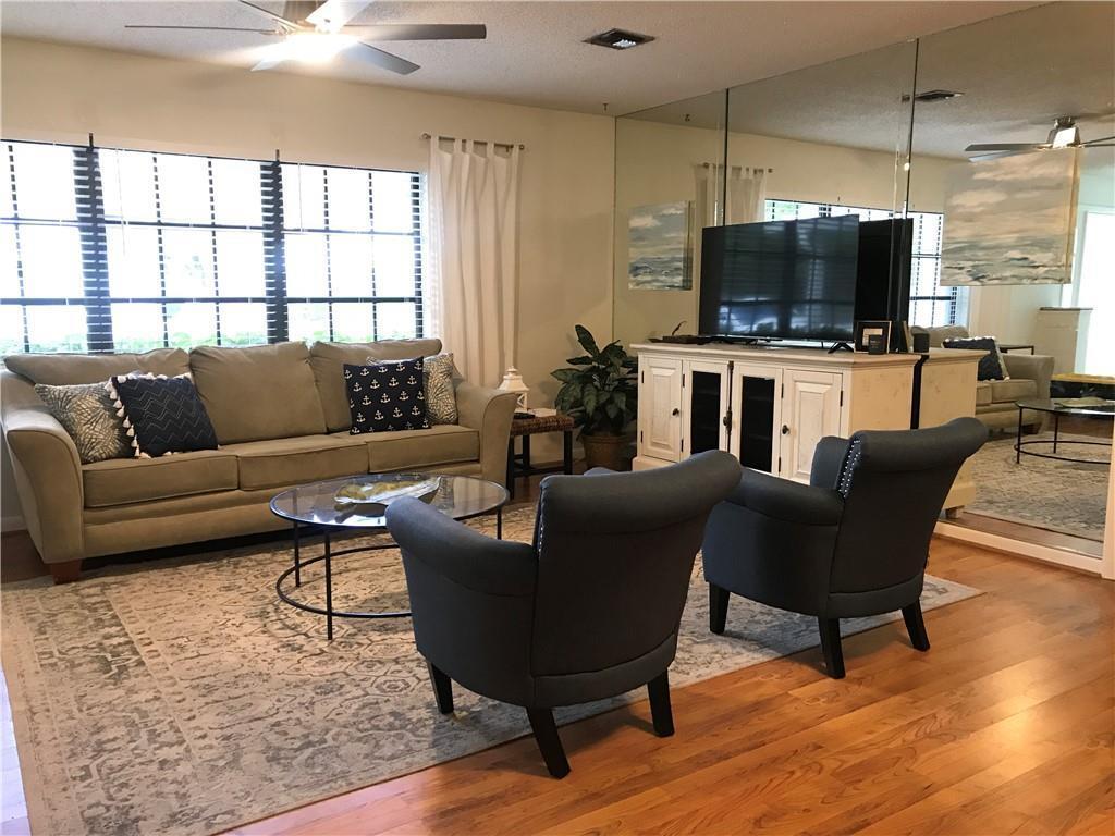 Coastal get-a-way for 3 month lease beginning Oct 1/ annual beginning Oct 1. Enjoy this airy 2bd/2 ba/1 car garage in fantastic central location. Split floor plan offers privacy, sunroom has large dining table for gatherings, sophisticated living rm offers sunny windows with laminate wood floors. Primary walk in closet is so large and 2 shower heads in nicely appointed bath. The backyard has a patio & tree lined yard, offering a great view from sunroom & kitchen. 5 miles to beach, 2 miles to downtown shops, eats & events.
