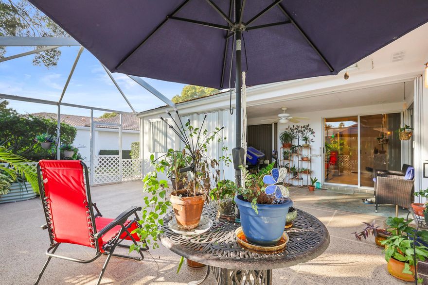 Practically perfect in every way! Welcome to 2404 Pin Oak Court, a stunning one-level villa nestled in a private, quiet section of the beautiful Oaks Sun Terrace. This popular DiVosta ''split bedroom'' floor plan feels like two primary suites, each featuring an updated bath.Highlights You'll Love:-True Indoor/Outdoor Living: Vaulted ceilings and open shelving create an airy feel, while glass sliders lead to an oversized patio--perfect for entertaining.-Modern Kitchen: Features a generous breakfast bar and sleek stainless steel appliances-Prime Location: Faces a lush green space (not a parking lot!) and is steps from the community pool. Just minutes from world-class dining, shopping, and beaches.Major ''Peace of Mind'' Upgrades: * NO POLYBUTYLENE PLUMBING* FULL ROOF RE-