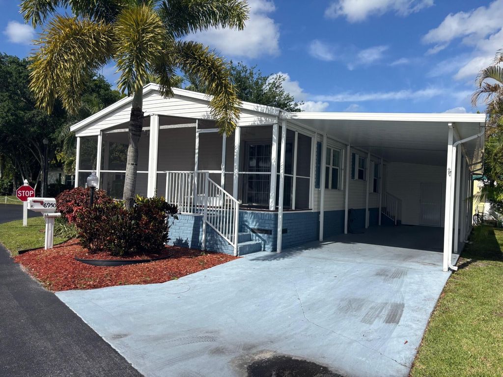 Photo of 6950 NW 44th Avenue, Coconut Creek, FL 33073 (MLS # B26015839)