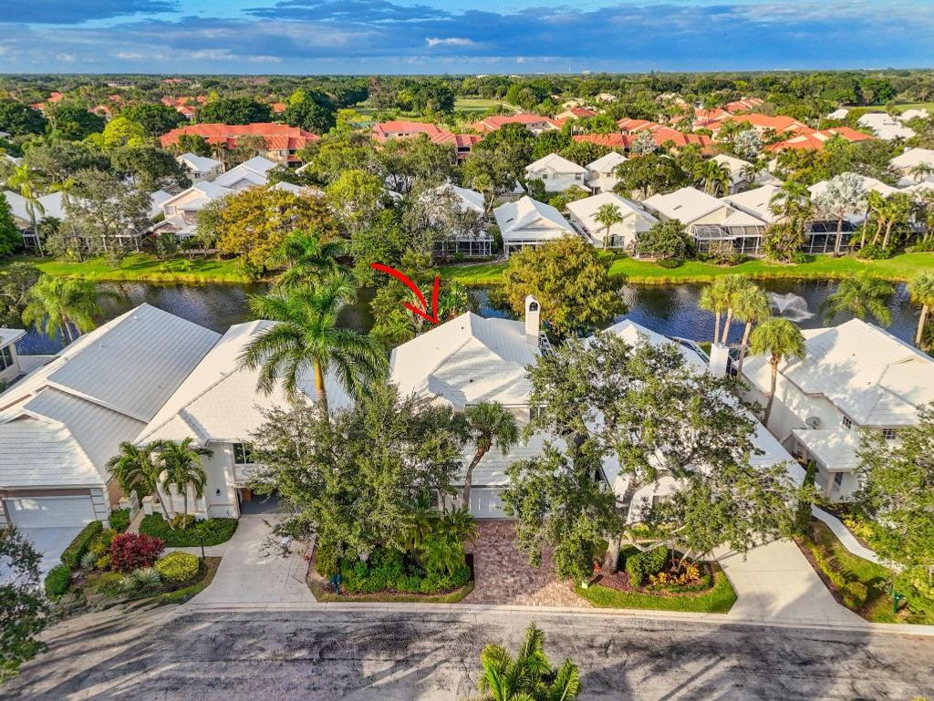 Photo of 221 Canterbury Drive W, Palm Beach Gardens, FL 33418 (MLS # R11138529)