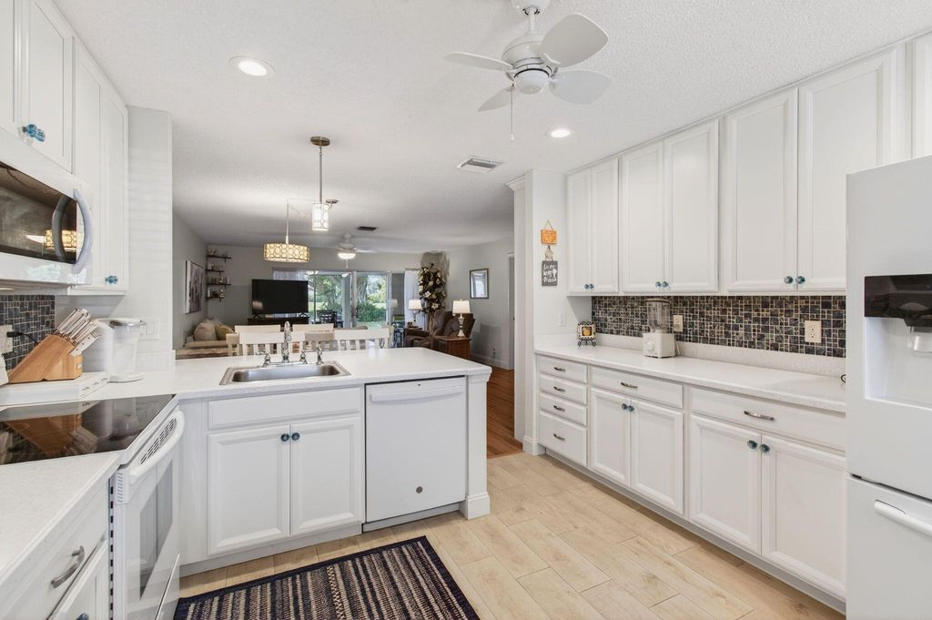 Photo of 5452 Poppy Place #D, Delray Beach, FL 33484 (MLS # R11160686)