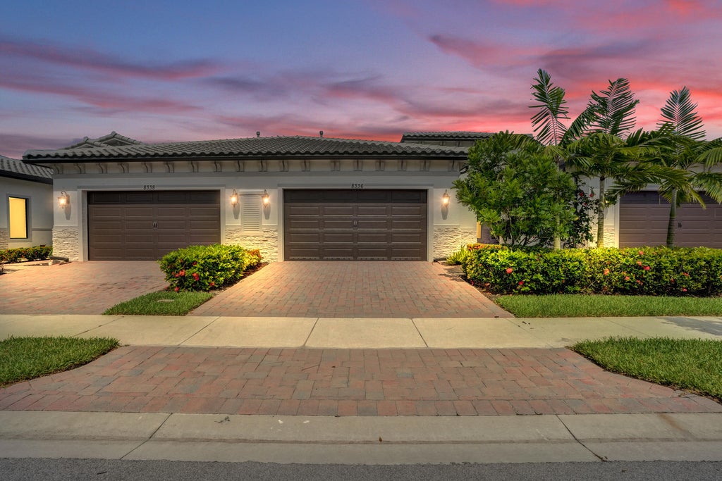 Photo of 6336 W Blue Spring Drive, Parkland, FL 33067 (MLS # B26042821)