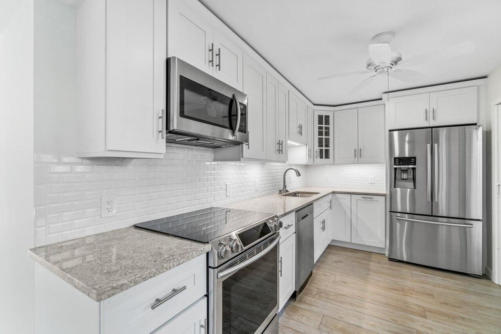 Photo of 4223 Quail Ridge Drive N #Sandpiper, Boynton Beach, FL 33436 (MLS # R10791483)