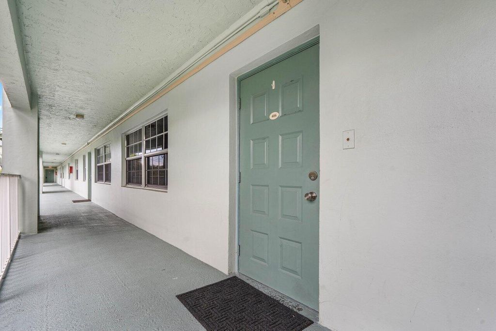 Photo of 802 Cypress Grove Lane #406, Pompano Beach, FL 33069 (MLS # R11056873)