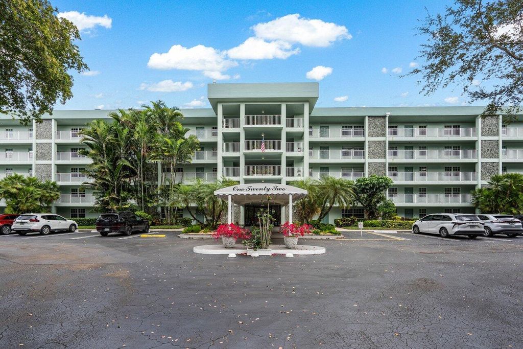 Photo of 802 Cypress Grove Lane #406, Pompano Beach, FL 33069 (MLS # R11056873)