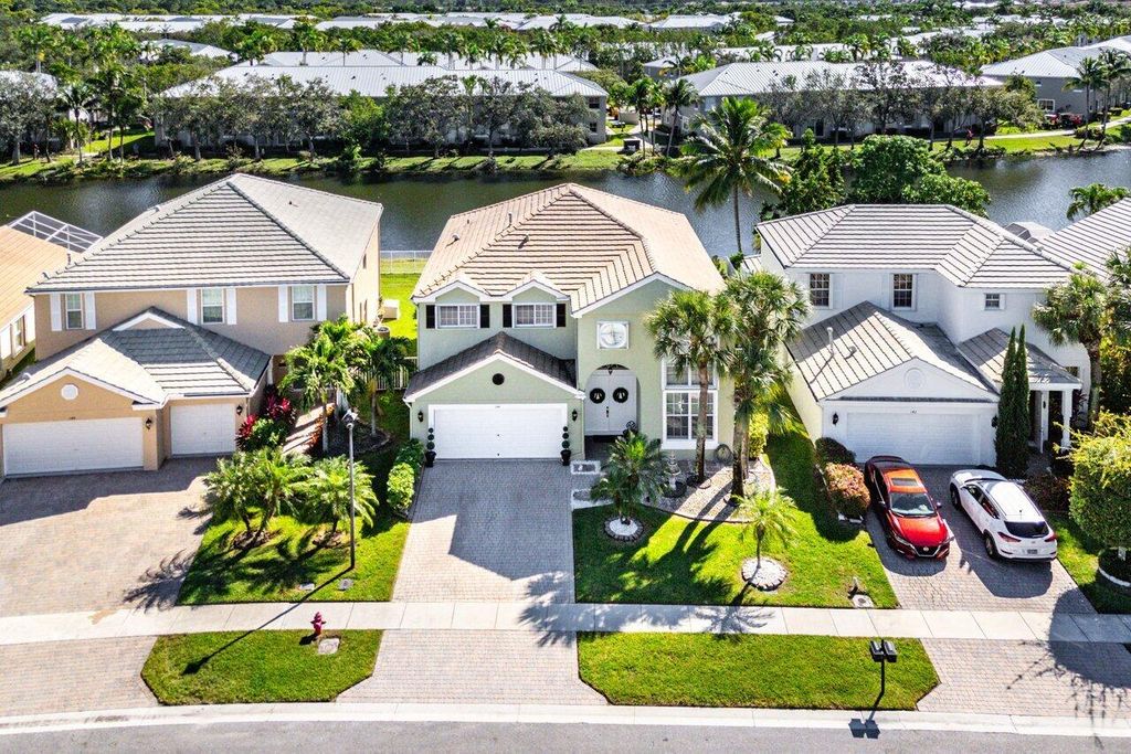 Photo of 144 Kensington Way, Royal Palm Beach, FL 33414 (MLS # R11142485)