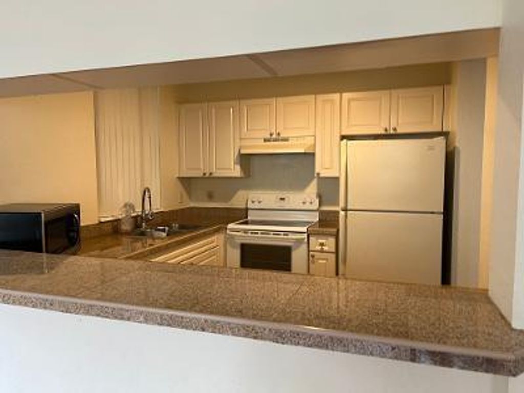 Photo of 6838 W Sample Road #6838, Coral Springs, FL 33067 (MLS # B26009186)