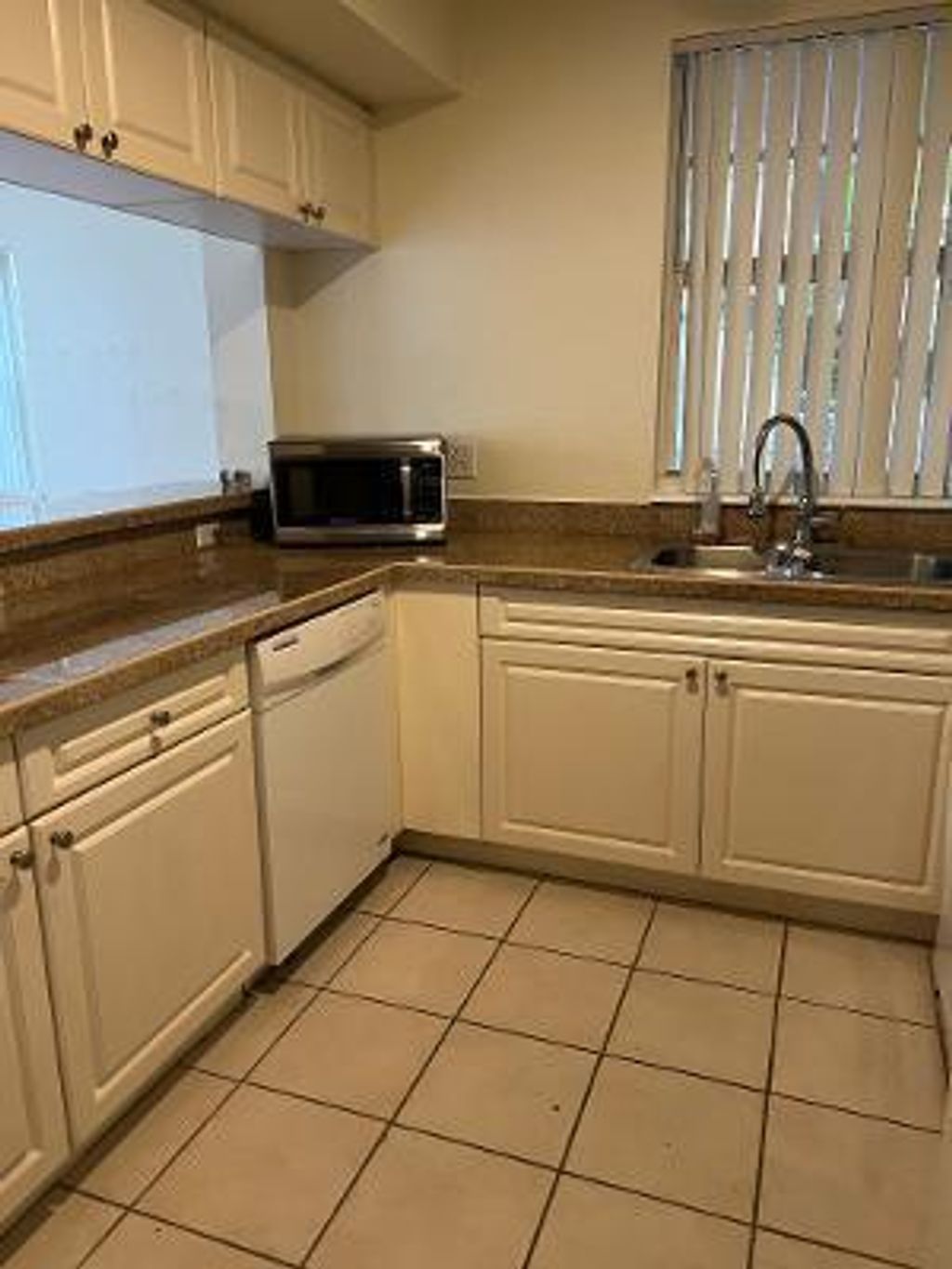 Photo of 6838 W Sample Road #6838, Coral Springs, FL 33067 (MLS # B26009186)