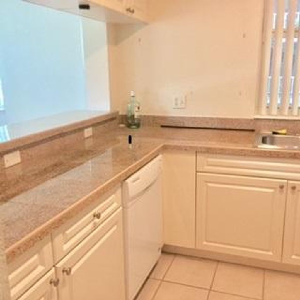 Photo of 6838 W Sample Road #6838, Coral Springs, FL 33067 (MLS # B26009186)