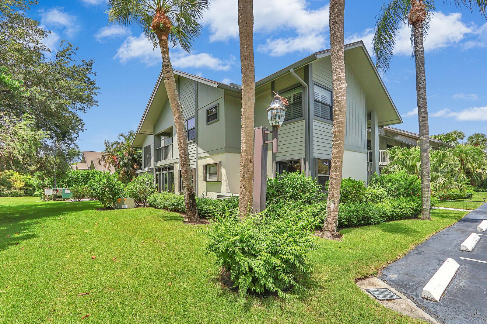 Welcome to this spacious 3 bedroom, ground level, corner unit in Charleston Place! Light and bright unit features enclosed porch, updated kitchen and baths with quartz countertops, full storm protection with impact glass and accordion shutters, and just steps to Charleston's community pool and clubhouse. Heritage Ridge offers pickleball, tennis, pool with spa, and an 18-hole public golf course with driving range. Great location near Hobe Sound public beach, shopping, restaurants and more! Please note, in addition to HOA, Heritage Ridge North has an annual fee of $495.