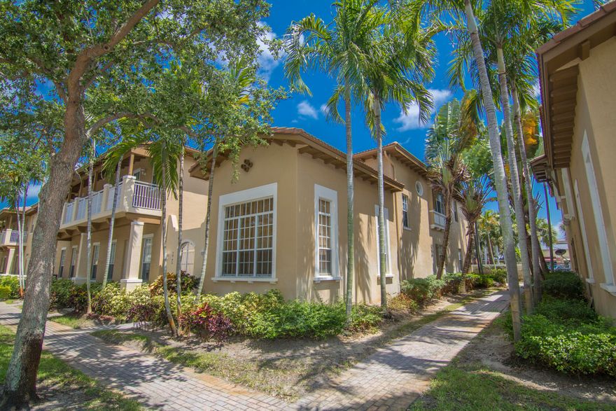 NEW, Big, Beautifully Furnished End Unit 3+den/2.5/2 with the double courtyard, Largest Model Floor plan available now in Canterbury at Quantum Village - Fresh and new - This home offers high volume ceilings and has a private gated exterior patio area as well as completely private courtyard area and 2 car garage, all within minutes to the Boyton Beach Tri-Rail Station, I-95, Boynton Beach Mall, Super Target, Boynton Beaches, Boynton Harbor Marina and a short ride to downtown Clematis. - Perfect location and ready to Move-In.