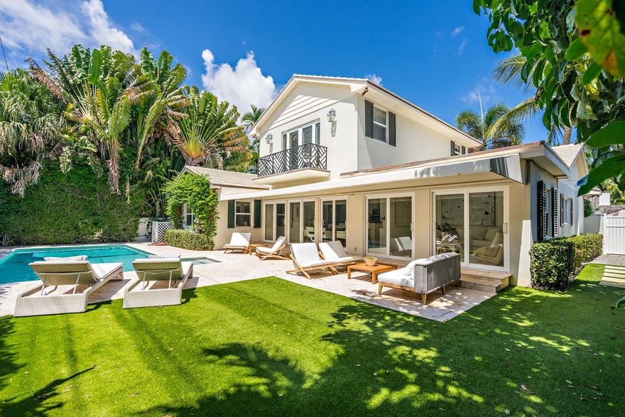 Light and bright Bermuda style 4-BR, 3-BA + den on the North End. This two story home has beautiful wood details throughout. Open kitchen and loggia perfect for entertaining overlooking saltwater pool with sunny southern exposure. Orange Grove has deeded access to the beach and Lake Trail.