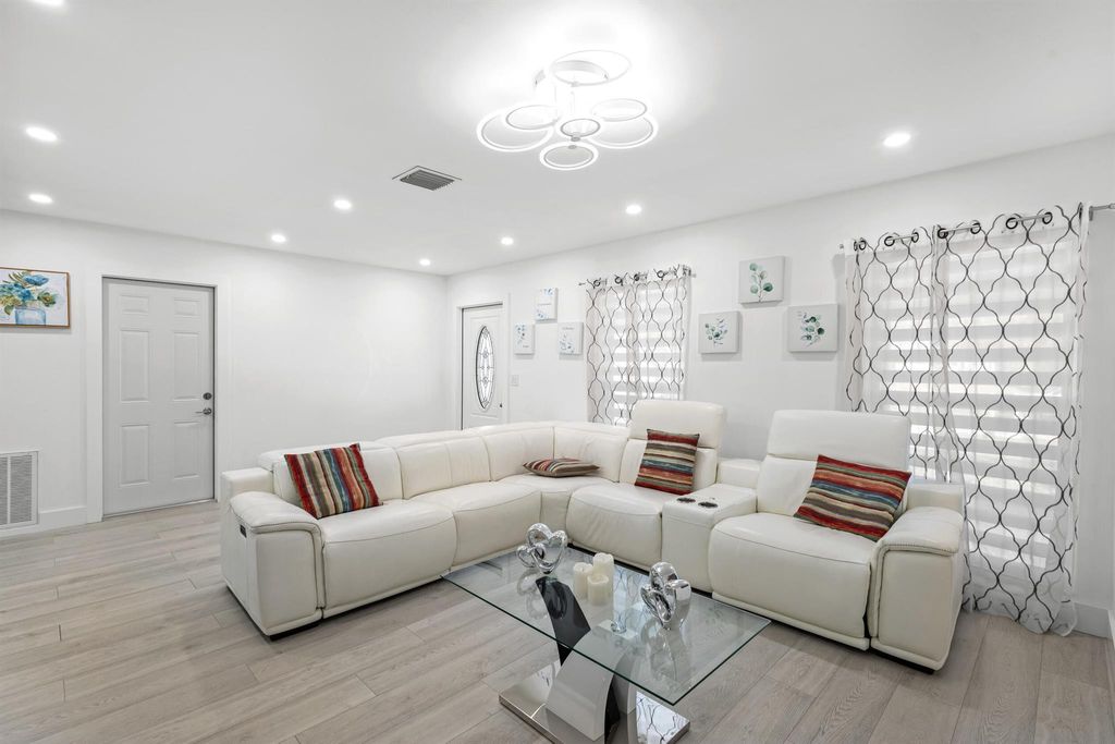 Photo of 298 NE Midfield Lane, Port Saint Lucie, FL 34983 (MLS # R11063888)