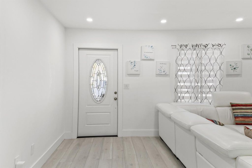 Photo of 298 NE Midfield Lane, Port Saint Lucie, FL 34983 (MLS # R11063888)