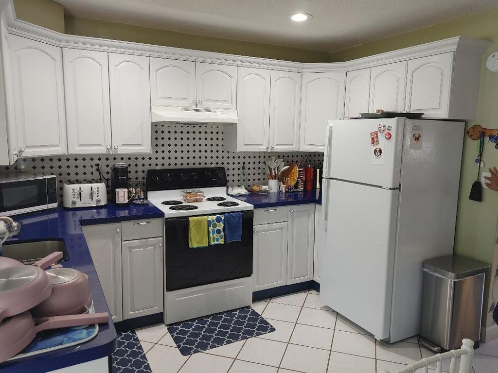 Photo of 5004 NW 49th Road, Tamarac, FL 33319 (MLS # F10521231)
