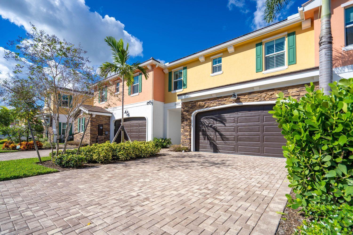 Lakeside luxury living in the heart of Palm Beach Gardens, within a tranquil and exclusive 50-home gated community. This secluded retreat is located in a top-rated school zone, ensuring an exceptional education for residents. Revel in the convenience of being mere minutes away from pristine beaches, the lively Downtown at the Gardens, Alton Town Center, Abacoa, Roger Dean Stadium, Gardens Mall, and PGA National.This meticulously upgraded townhome features a 2 car garage with epoxy floors, seamlessly blending functionality with style. Immerse yourself in the latest technology with a smart home setup that includes a Google Nest doorbell, Nest smart front door lock, Nest camera on the back porch, and Nest thermostat.