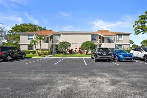 Photo of 13369 Touchstone Place #101, Palm Beach Gardens, FL 33418 (MLS # B26007753)