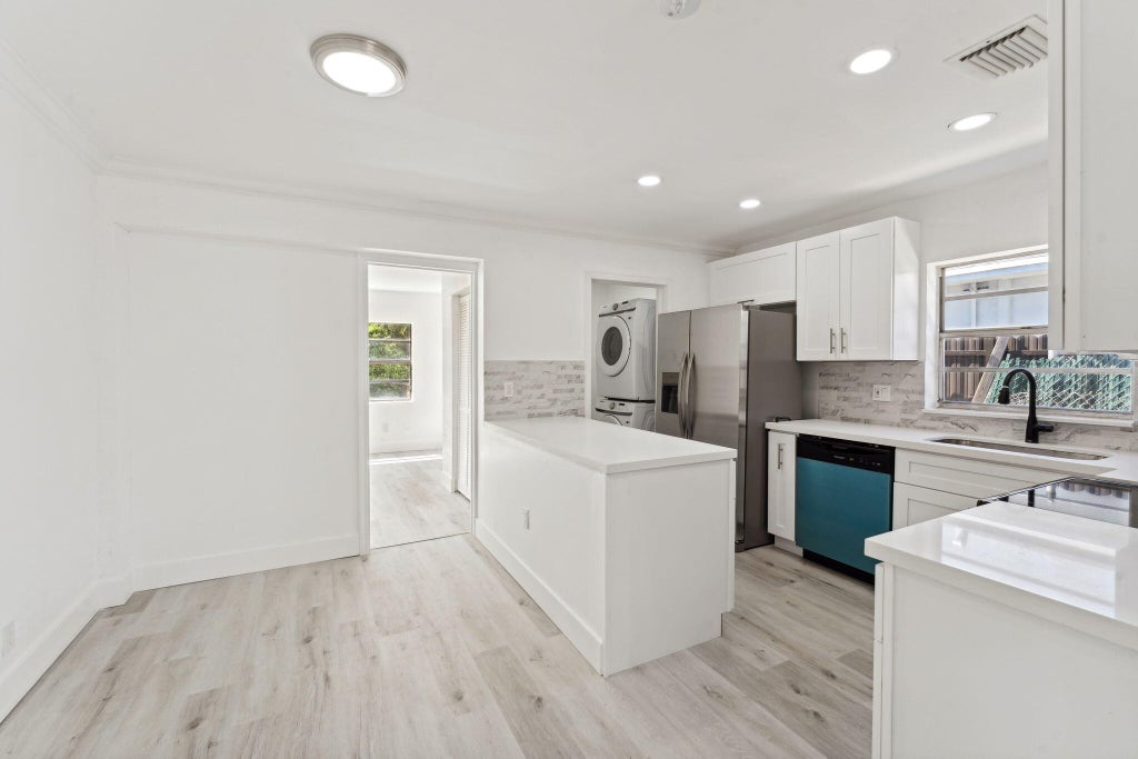 Photo of 489 NW 2 Way, Deerfield Beach, FL 33441 (MLS # R10977939)