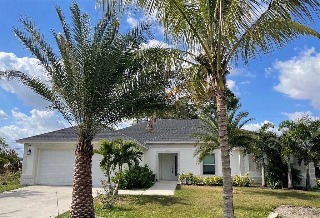 Photo of 3166 SW Blackmur Street, Port Saint Lucie, FL 34953 (MLS # R10774783)